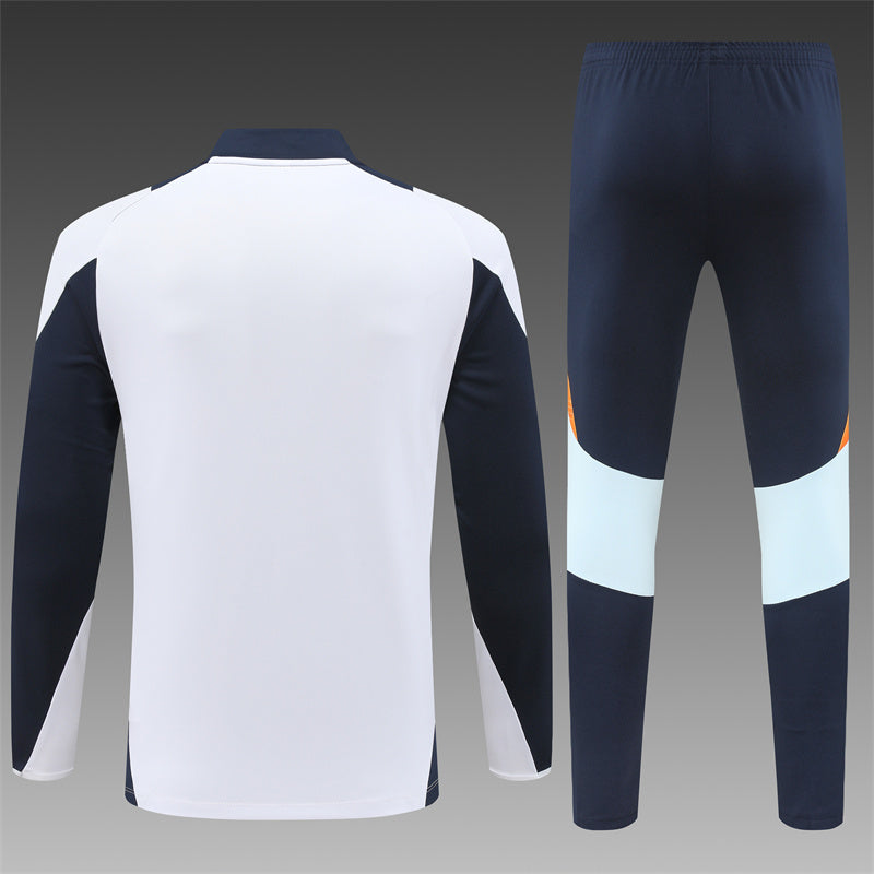 Real Madrid Trainingsanzug – Weiß/Orange KINDER